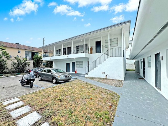 2414 Johnson St, Hollywood, FL 33020 - view of property featuring stairs
