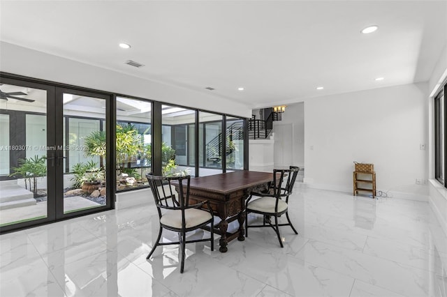 dining space with light marble finish floors, recessed lighting, french doors, and baseboards