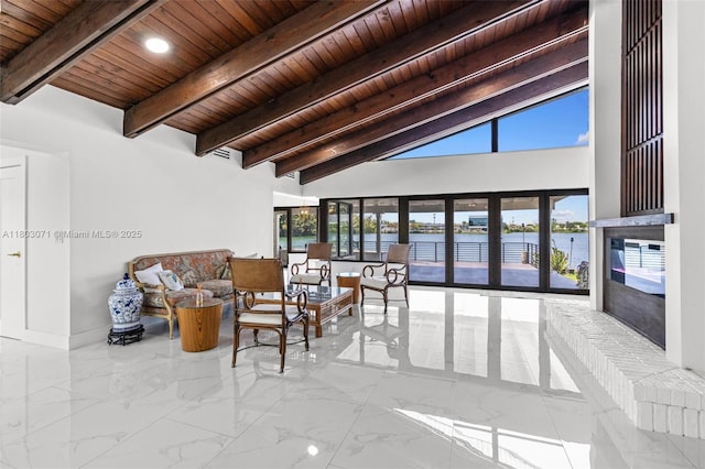 lobby featuring wooden ceiling and a water view