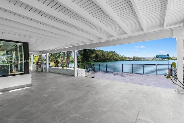view of patio featuring a water view