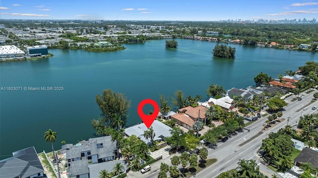 view of urban area featuring a large body of water