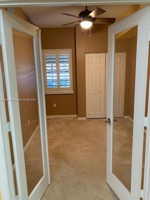 4907 Midtown Ln Unit 1113, Palm Beach Gardens, FL 33418 - hall featuring light carpet and baseboards