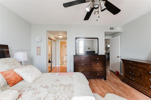 4330 Hillcrest Dr Unit 505, Hollywood, FL 33021 - bedroom with light wood finished floors, connected bathroom, and ceiling fan