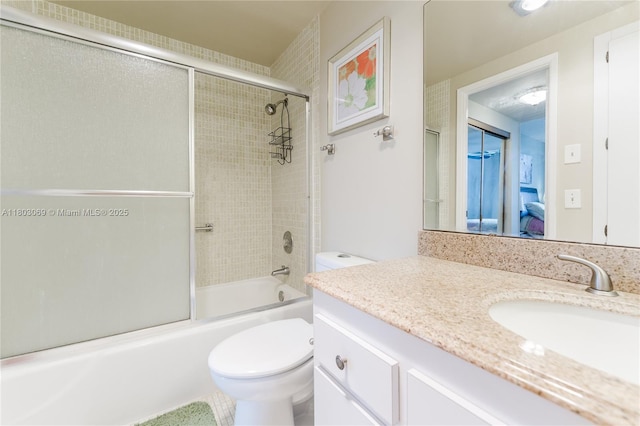 4330 Hillcrest Dr Unit 505, Hollywood, FL 33021 - full bath featuring toilet, vanity, enclosed tub / shower combo, and ensuite bath