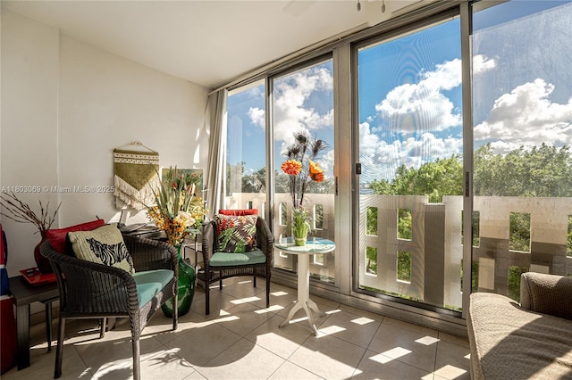 4330 Hillcrest Dr Unit 505, Hollywood, FL 33021 - sunroom with tile patterned flooring and floor to ceiling windows