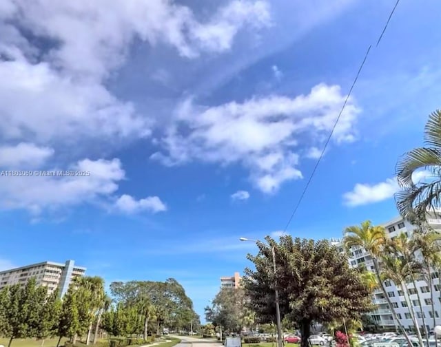 4330 Hillcrest Dr Unit 505, Hollywood, FL 33021 - view of asphalt road featuring street lighting and sidewalks