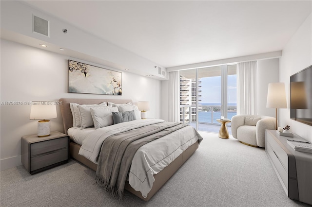 450 Alton Rd Unit 2303, Miami Beach, FL 33139 - bedroom featuring access to exterior and carpet