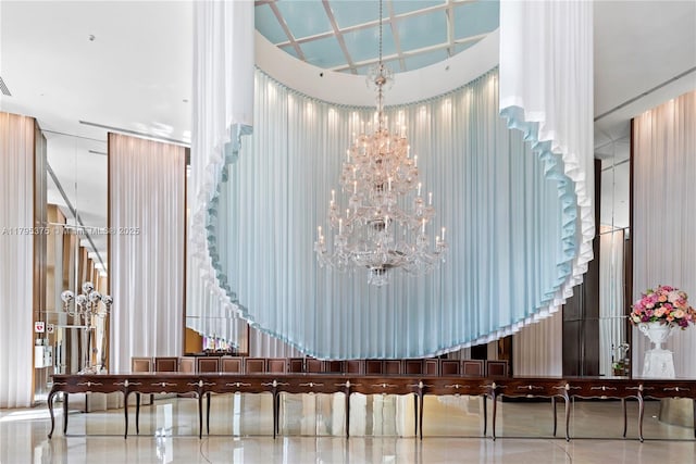 450 Alton Rd Unit 2303, Miami Beach, FL 33139 - common area featuring a high ceiling and stairway