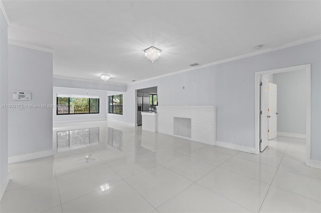 1998 NE 180th St, North Miami Beach, FL 33162 - spare room with baseboards, crown molding, light tile patterned floors, and a smoke detector
