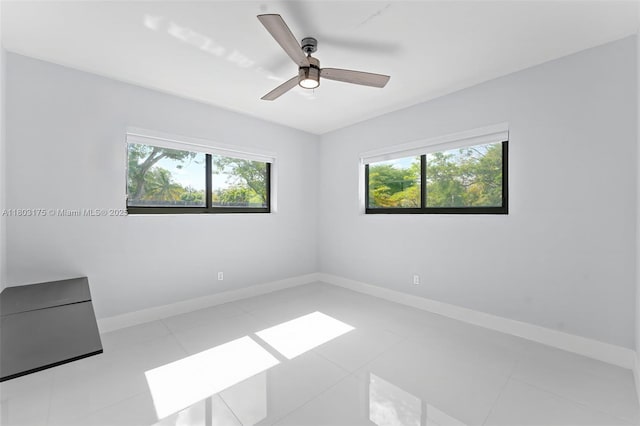 1998 NE 180th St, North Miami Beach, FL 33162 - kitchen featuring appliances with stainless steel finishes, white cabinets, a sink, light tile patterned flooring, and backsplash