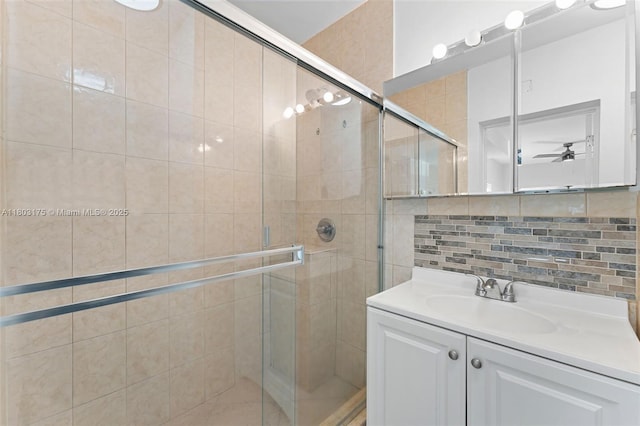 1998 NE 180th St, North Miami Beach, FL 33162 - bathroom featuring tile walls, toilet, vanity, wainscoting, and tile patterned flooring