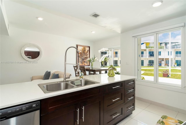 13949 SW 259th Way, Homestead, FL 33032 - kitchen featuring stainless steel dishwasher, a sink, light countertops, light tile patterned floors, and recessed lighting