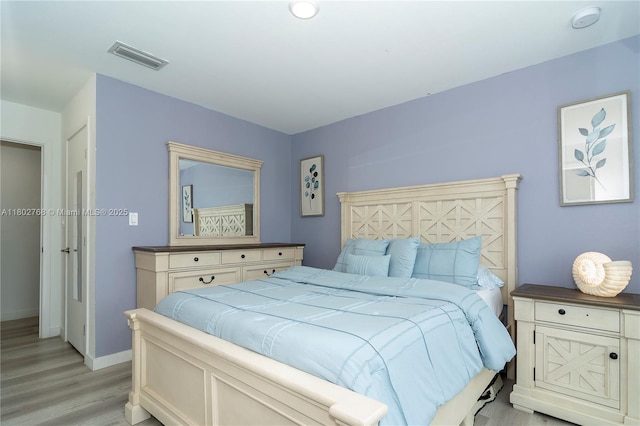 13949 SW 259th Way, Homestead, FL 33032 - bedroom with light wood-style flooring and baseboards