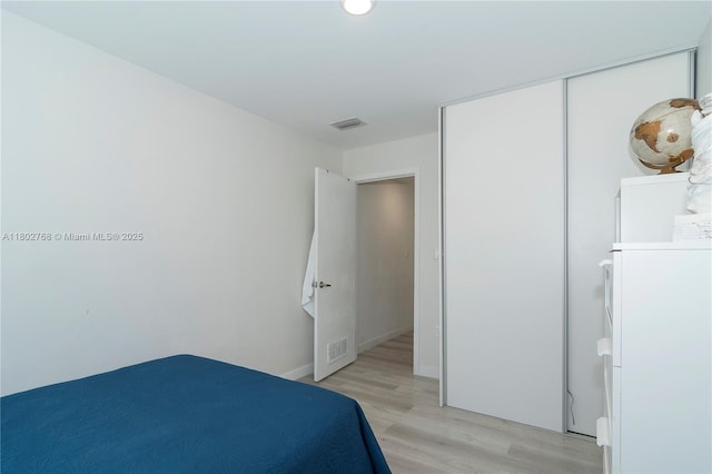 13949 SW 259th Way, Homestead, FL 33032 - bedroom featuring light wood finished floors, a closet, and recessed lighting