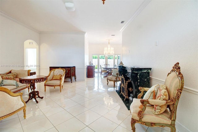 9072 NW 145th St, Miami Lakes, FL 33018 - living area featuring crown molding, a chandelier, light tile patterned flooring, and arched walkways