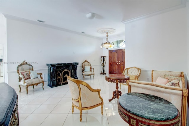 9072 NW 145th St, Miami Lakes, FL 33018 - tiled living room featuring a chandelier, ornamental molding, and a fireplace
