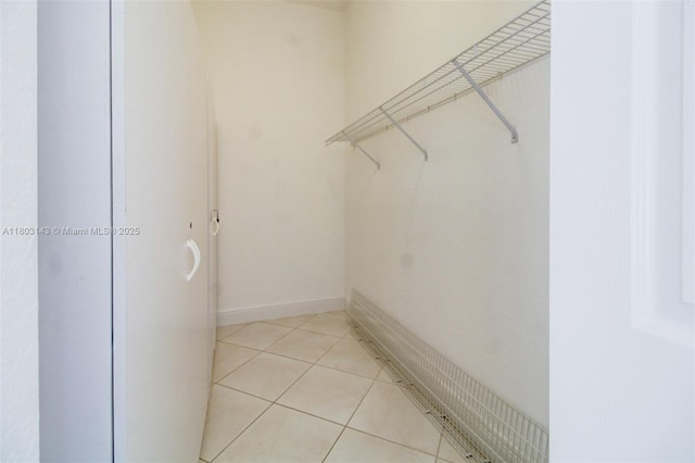 9072 NW 145th St, Miami Lakes, FL 33018 - spacious closet with light tile patterned floors