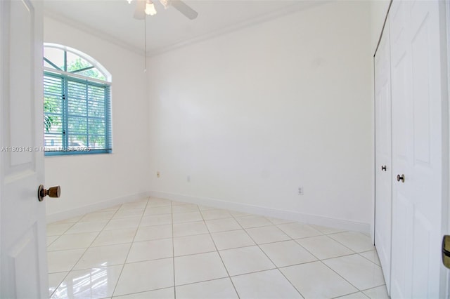 9072 NW 145th St, Miami Lakes, FL 33018 - empty room with a ceiling fan, baseboards, ornamental molding, and light tile patterned floors