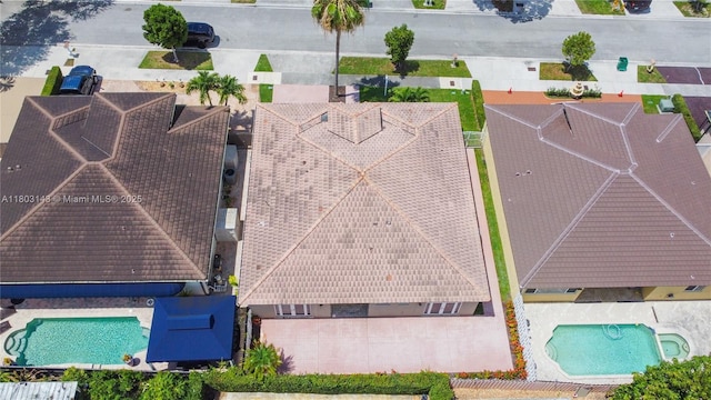 9072 NW 145th St, Miami Lakes, FL 33018 - drone / aerial view of a pool