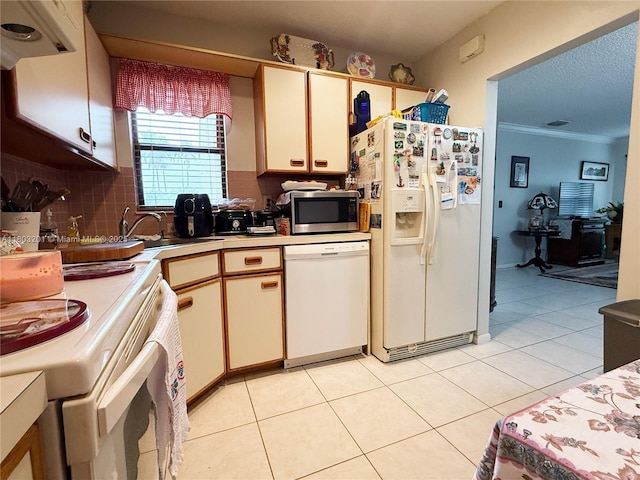 2903 S Carambola Cir S Unit 2094, Coconut Creek, FL 33066 - kitchen with white appliances, extractor fan, light countertops, tasteful backsplash, and crown molding