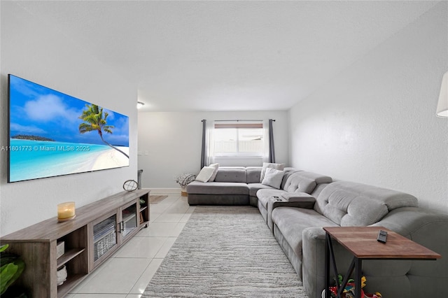 857 W 37th St, Hialeah, FL 33012 - living area featuring light tile patterned floors and baseboards