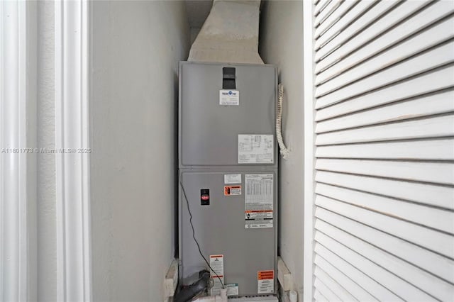 857 W 37th St, Hialeah, FL 33012 - utility room featuring heating unit