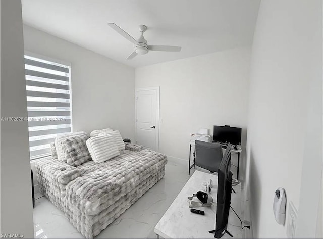 2838NW Embers Ter, Cape Coral, FL 33993 - bedroom with light marble finish floors, an office area, and a ceiling fan