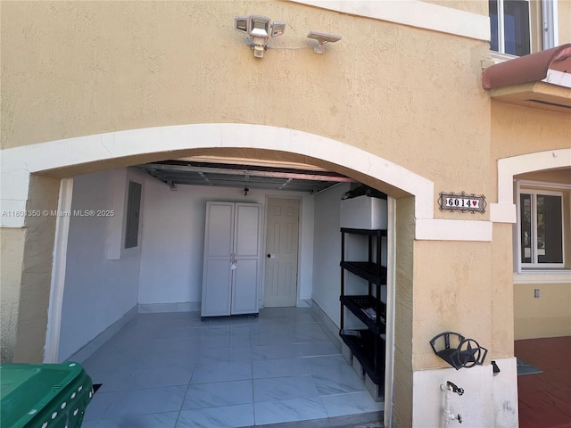 6014 SW 162nd Pl, Miami, FL 33193 - entrance to property featuring stucco siding and electric panel