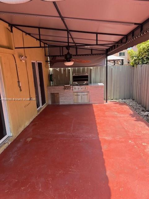 6014 SW 162nd Pl, Miami, FL 33193 - view of patio with an outdoor kitchen