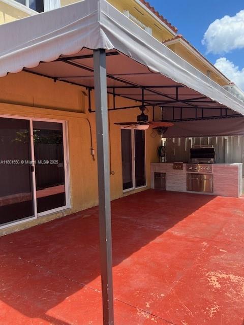 6014 SW 162nd Pl, Miami, FL 33193 - laundry room with washing machine and dryer and marble look tile flooring