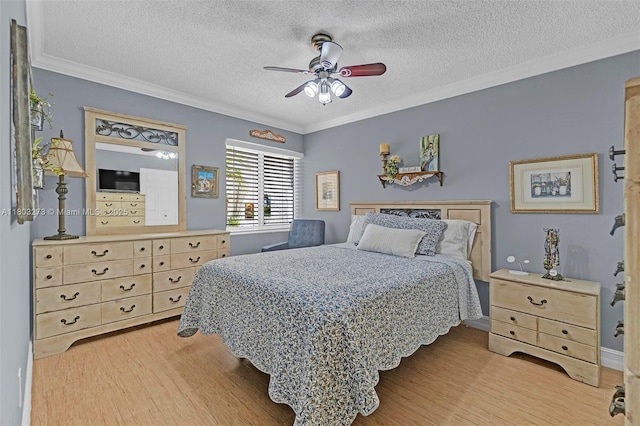 13338 SW 8th Ln, Miami, FL 33184 - bedroom featuring light wood-style floors, ornamental molding, a textured ceiling, and ceiling fan