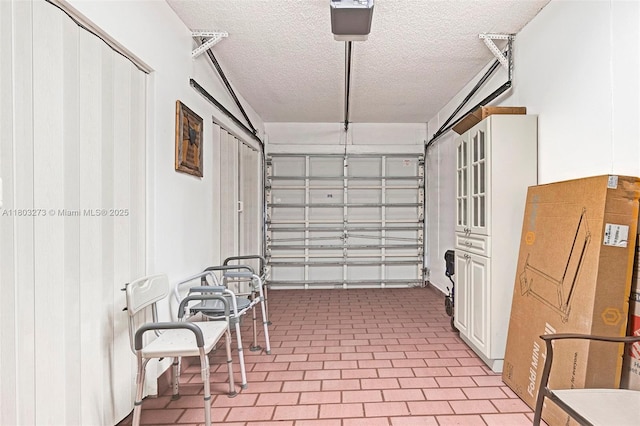 13338 SW 8th Ln, Miami, FL 33184 - garage featuring a garage door opener
