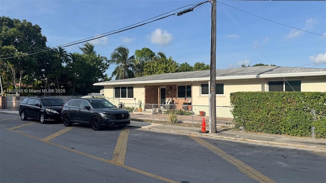 111 SW 24th Ave, Miami, FL 33135 - ranch-style home with fence and stucco siding