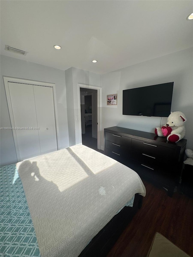 111 SW 24th Ave, Miami, FL 33135 - bedroom featuring a closet, recessed lighting, and dark wood finished floors