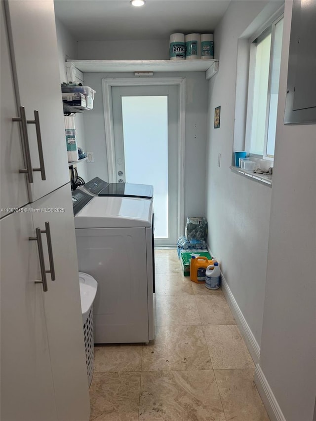 111 SW 24th Ave, Miami, FL 33135 - clothes washing area featuring independent washer and dryer, electric panel, healthy amount of natural light, and baseboards