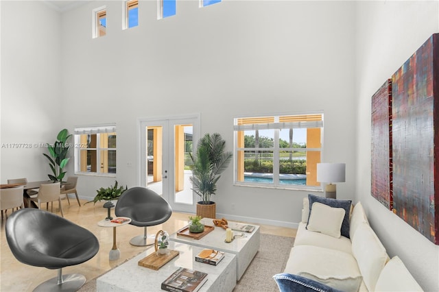 3837 E Coquina Way, Weston, FL 33332 - living room with a towering ceiling, french doors, and baseboards