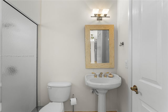 3837 E Coquina Way, Weston, FL 33332 - bathroom featuring a stall shower, toilet, and a sink