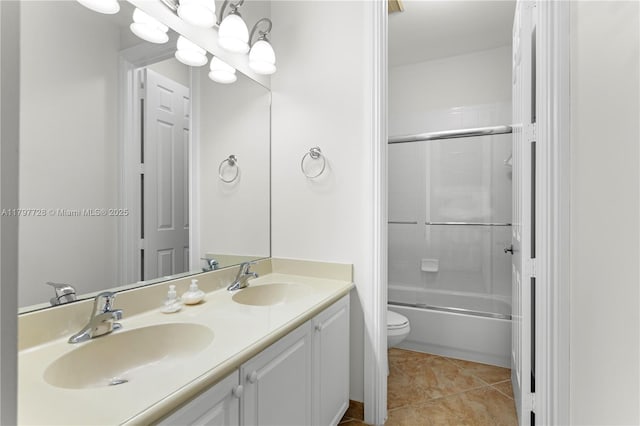 3837 E Coquina Way, Weston, FL 33332 - full bath featuring toilet, double vanity, shower / bath combination with glass door, and tile patterned flooring