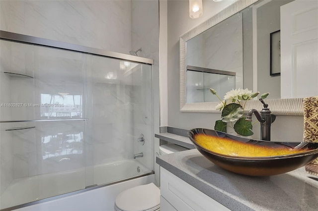 15331 SW 20th St, Miramar, FL 33027 - bathroom with combined bath / shower with glass door, vanity, and toilet