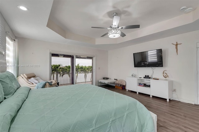 15331 SW 20th St, Miramar, FL 33027 - bedroom with access to exterior, wood finished floors, recessed lighting, a raised ceiling, and a ceiling fan