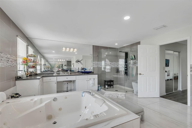 15331 SW 20th St, Miramar, FL 33027 - bathroom with a stall shower, a jetted tub, and vanity