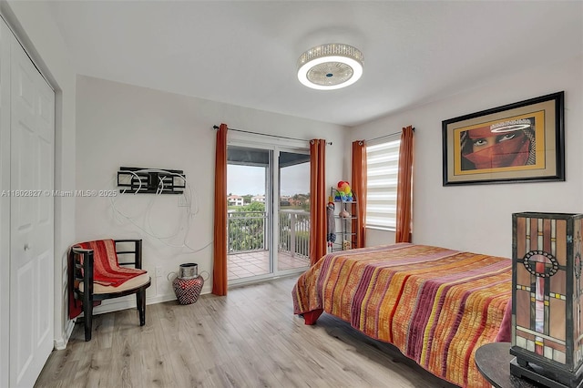 15331 SW 20th St, Miramar, FL 33027 - bedroom featuring access to outside, wood finished floors, and baseboards