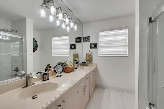 15331 SW 20th St, Miramar, FL 33027 - full bath with an enclosed shower, tile patterned floors, double vanity, and baseboards