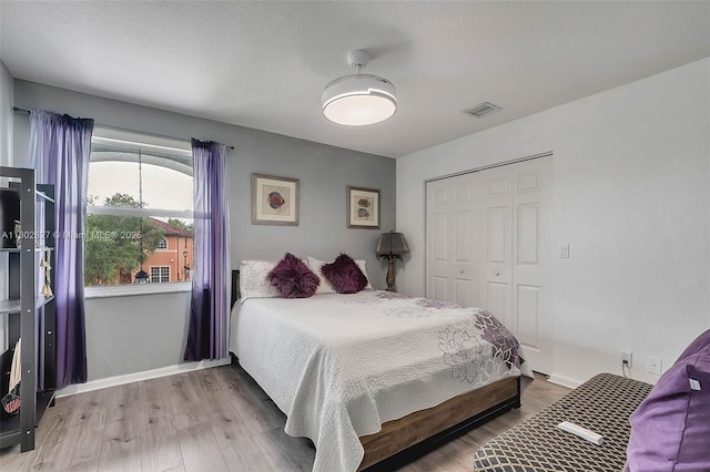 15331 SW 20th St, Miramar, FL 33027 - bedroom with a closet, light wood-type flooring, and baseboards