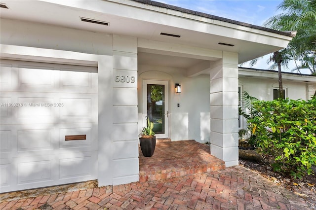 6809 Mentone St, Coral Gables, FL 33146 - property entrance featuring a garage