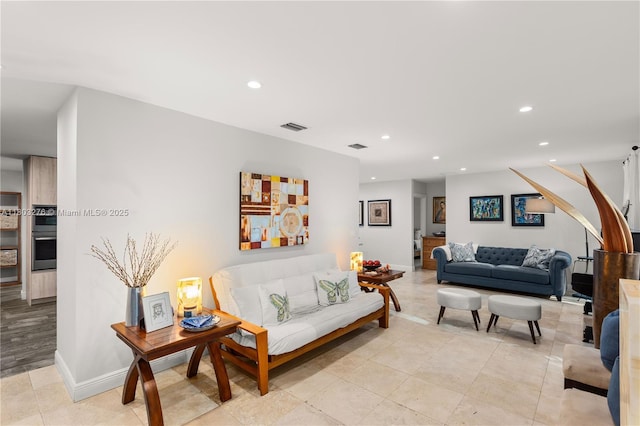 6809 Mentone St, Coral Gables, FL 33146 - living room featuring recessed lighting, light tile patterned floors, and baseboards