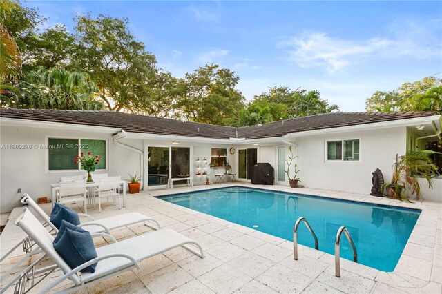 6809 Mentone St, Coral Gables, FL 33146 - swimming pool featuring a patio and grilling area