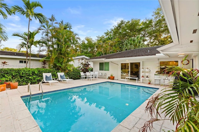 6809 Mentone St, Coral Gables, FL 33146 - swimming pool featuring a patio area