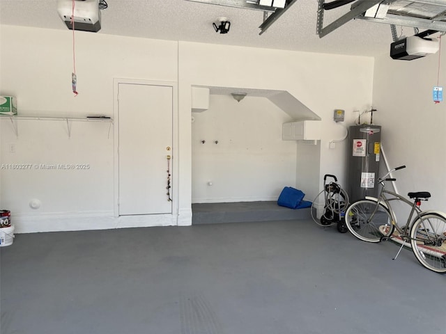 14737 SW 132nd Ct, Miami, FL 33186 - garage featuring a garage door opener and electric water heater