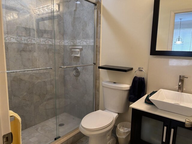 14737 SW 132nd Ct, Miami, FL 33186 - bathroom featuring toilet, a stall shower, and vanity